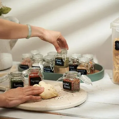 Obrázok produktu pre Sada 12 sklenených nádob na korenie s viečkom – Famanu