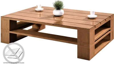 A wooden coffee table with a plant and a cup on it, set against a white background.