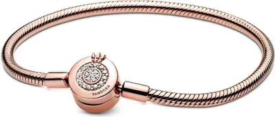 A rose gold Pandora bracelet with a crown-shaped clasp adorned with crystals.