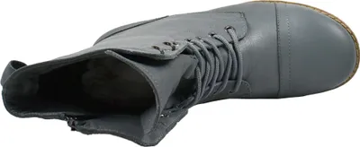 A top-down view of a gray leather boot.