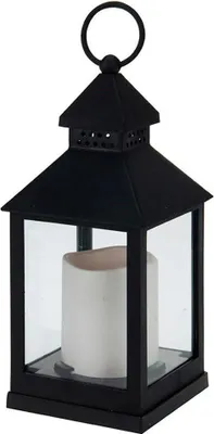A black metal lantern with a white LED candle inside, set against a white background.