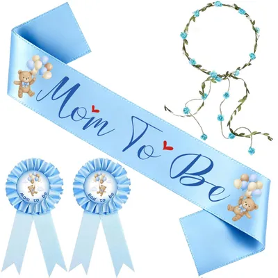 Produktbild von Set für eine Babyparty für Jungen, bestehend aus einer Schleife, Abzeichen und einem Blumenkranz