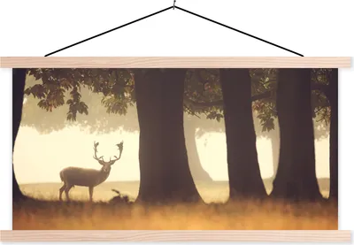 Produktbild von MuchoWow® Textilposter Hirsche - Bäume - Wald 120x60 cm mit holzfarbenen Rahmen - Klemmleiste
