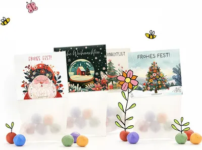 Produktbild von 60 Blumenmurmeln im Tütchen – Weihnachtsgeschenk-Set mit 12 Tütchen á 5 Seedbombs – Nachhaltige Geschenkidee & Mitbringsel – Bunte Wildblumen-Saatkugeln für Kinder & Erwachsene