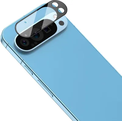 A close-up shot of a phone's camera lens protector being placed on the phone.