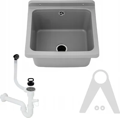 A sink basin with plumbing accessories and mounting brackets.