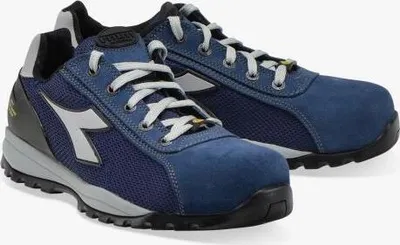 A pair of blue Diadora work shoes on a white background.