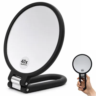 Imagen del producto de Espejo de aumento de doble cara, con aumento de 40x y 1x, ideal para maquillaje