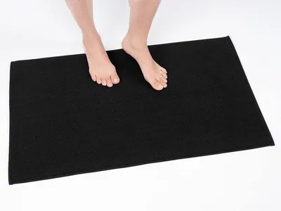 Produktbild von Famanu Badmatte 100% Baumwolle - Antirutsch, weich, saugfähig, schnell trocknend, 50 x 86 cm, schwarz