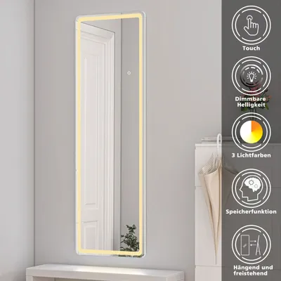 A full-length mirror with integrated LED lighting is displayed in a room, reflecting a door and a plant. Informational icons and text are overlaid on the right side of the image.