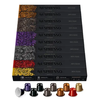 A box of Nespresso coffee capsules and several individual capsules displayed in front of the box.
