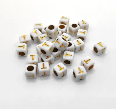 Immagine prodotto di Perline di lettere, 30 pezzi, 6x6 mm, bianche con oro, quadrate, lettera T