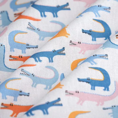 Imagen del producto de Tela de algodón estampada con diseño de cocodrilo de colores, 140 cm de ancho, con certificación