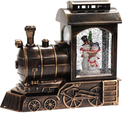 A decorative musical train with snowmen inside.