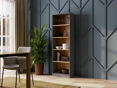 A tall, narrow bookshelf filled with decorative items and dishes, placed in a dining room setting next to a dining table and chair.
