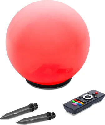A red illuminated sphere with a black base, accompanied by a remote control and two stakes, all on a white background.