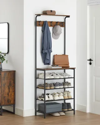 A hallway with a coat rack and shoe storage unit.