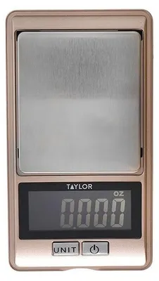 Productafbeelding van Taylor Pro Weegschaal: Nauwkeurigheid tot 0,01 gram, draagbaar, kunststof en roestvrij staal, in cadeauverpakking, 500 gram / 16 ounce, goud/roze