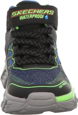 A close-up front view of a child's Skechers waterproof boot.