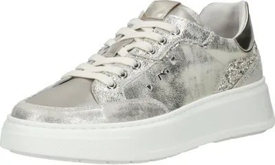 A studio shot of a single sneaker.