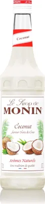 A bottle of Monin Coconut syrup with coconuts and leaves depicted on the label.