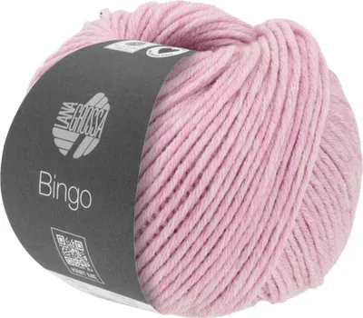 A ball of pink yarn with a label.