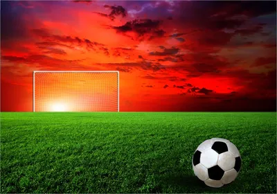 Produktbild von Wallario selbstklebendes Poster - Fußball - Fußballfeld bei Sonnenuntergang, Größe: 70 x 100 cm