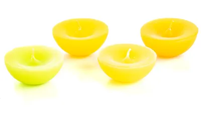 Produktbild von 4er Set Schwimmkerzen Kerzen in gelb, grün, orange
