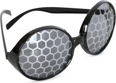 A pair of novelty sunglasses with a honeycomb pattern on the lenses.