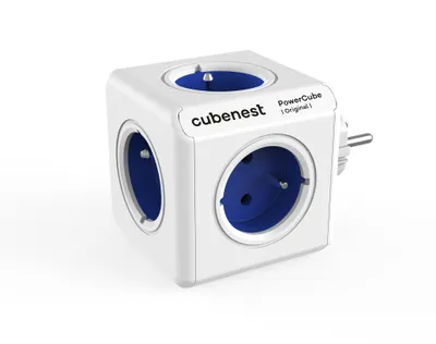 A white cube-shaped power strip with blue outlets is shown against a white background.