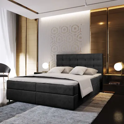 A luxurious bedroom with a large bed, bedside tables, and decorative wall panels.