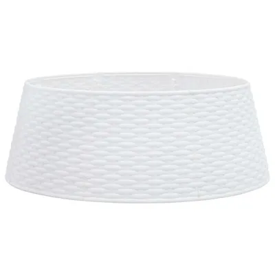 A white, textured Christmas tree skirt is shown against a white background.