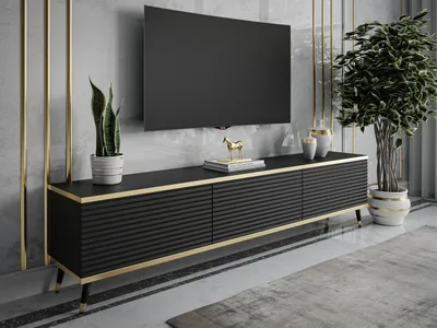 A modern living room setting with a TV stand and television.