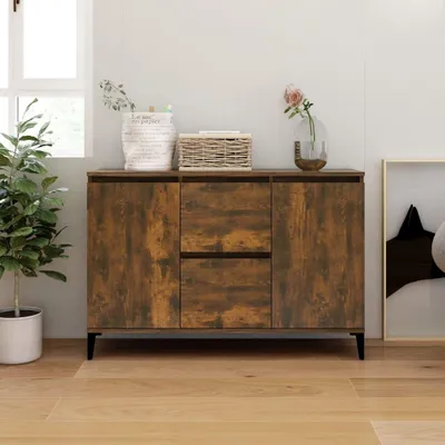 A wooden sideboard with two drawers and two doors, placed in a room with a plant and a window.