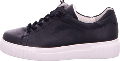 A side view of a dark blue leather sneaker with a white sole.
