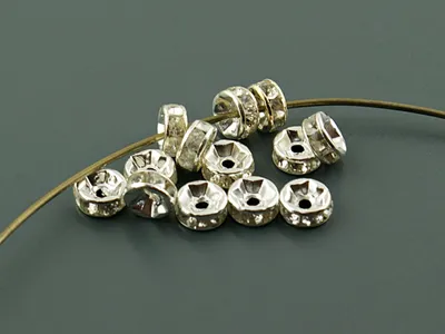 Produktbild von Vintageparts Zwischenperlen mit Strasssteinen silberfarben rund 7mm, 20 Stück