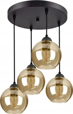 A black pendant light fixture with four amber glass globe shades hanging from a circular black base.