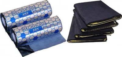 Two rolls of sound deadening material and a stack of dark fabric mats.