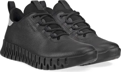A pair of black ECCO sneakers on a white background.