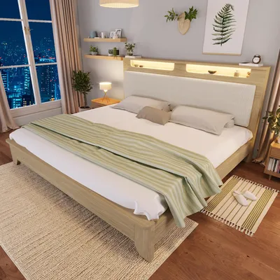 A bedroom scene with a bed, nightstands, and window.
