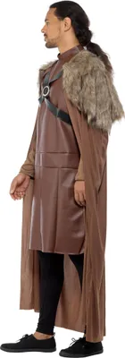 A man wearing a brown and black medieval-style costume, shown from the side against a white background.