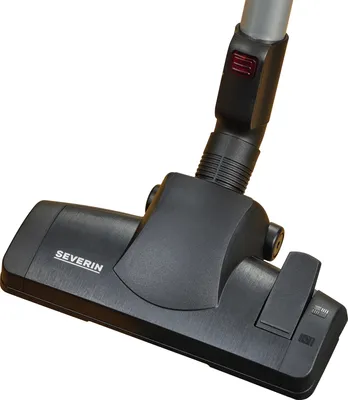 Close-up shot of a vacuum cleaner head attachment.
