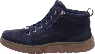 A side view of a navy blue suede boot with a brown sole.