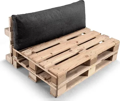 A sofa cushion set made from wooden pallets and a black cushion.