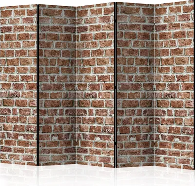A room divider with a brick wall pattern.