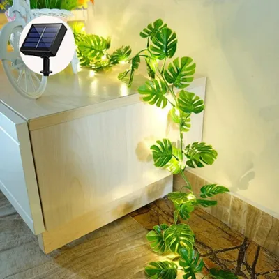 Zdjęcie produktu dla Światełko solarny z sztucznymi liśćmi palmowymi, długość 5 metrów, 50 diod LED, światło ciepłej barwy, do dekoracji