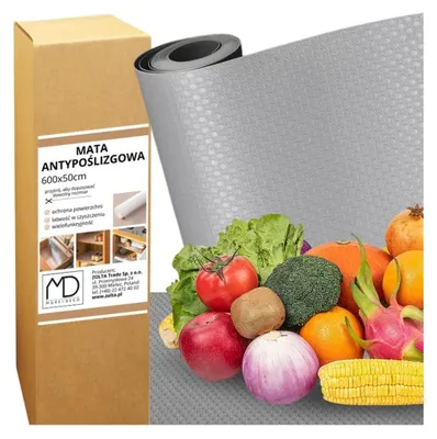 A product shot of an anti-slip mat with a variety of fruits and vegetables, along with its packaging.