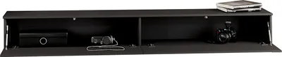 A black TV lowboard with open compartments, showing electronic devices and a camera inside.