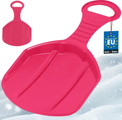 A pink plastic snow sled with a handle, shown on a snowy background.