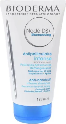 A product shot of a Bioderma shampoo bottle.